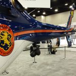O estande da Bell Helicopters teve como grande destaque a exposição do Bell 429 da polícia do condado de Nassau/NY, em sua configuração multimissão, com glass cockpit, kit aeromédico, estação de monitoramento do sistema imageador e farol de busca Trakkabeam.
