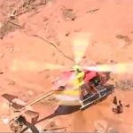 Equipe do helicóptero do Corpo de Bombeiros socorre vítimas do rompimento da barragem de Brumadinho, MG. Imagem: Reprodução TV Record.