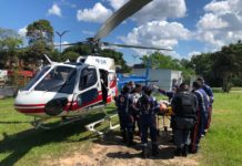 Criança vítima de acidente na AM-010 é transporta de helicóptero de Itacoatiara para Manaus, AM